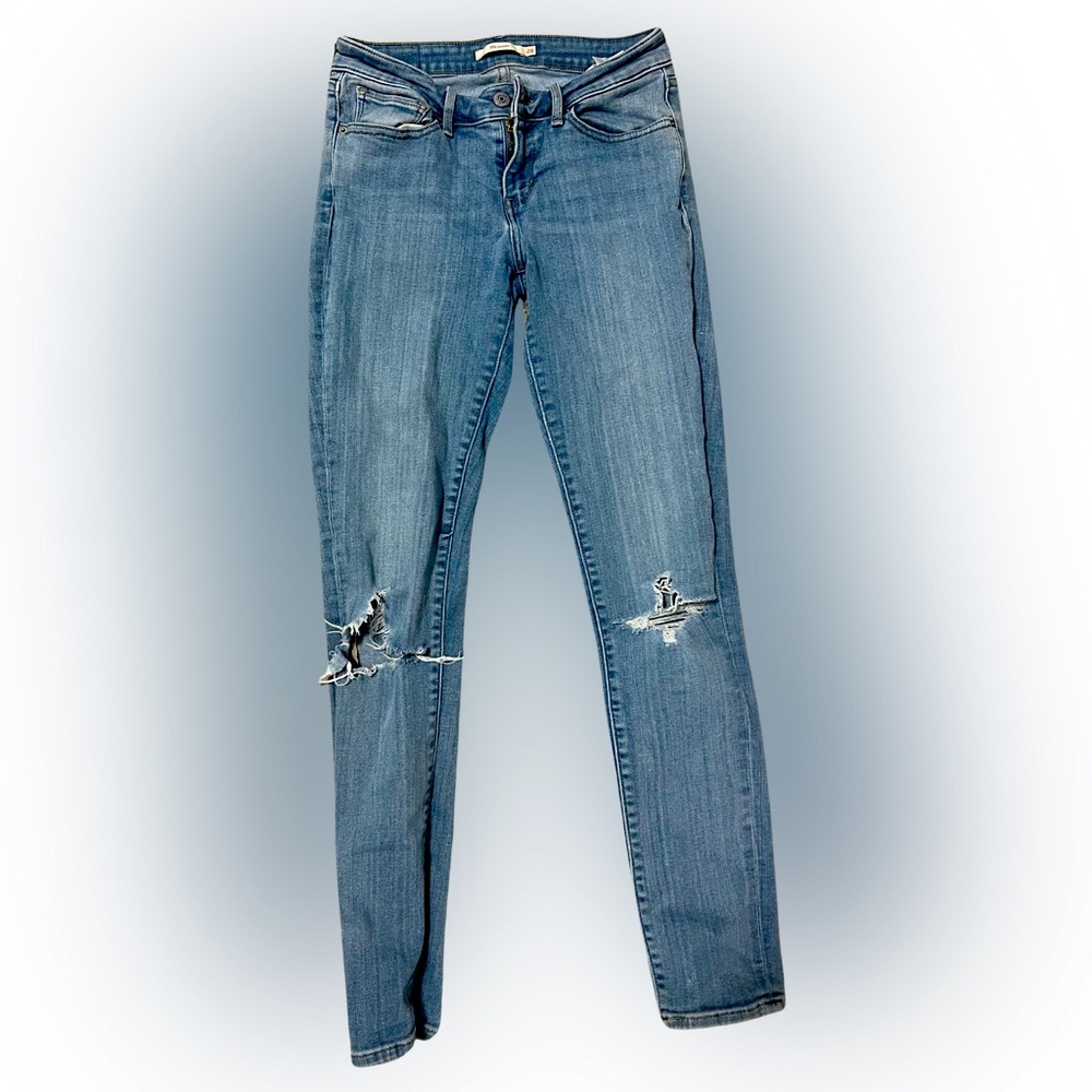 Levi’s 711 skinny distressed knees only. Light denim. Great condition 28